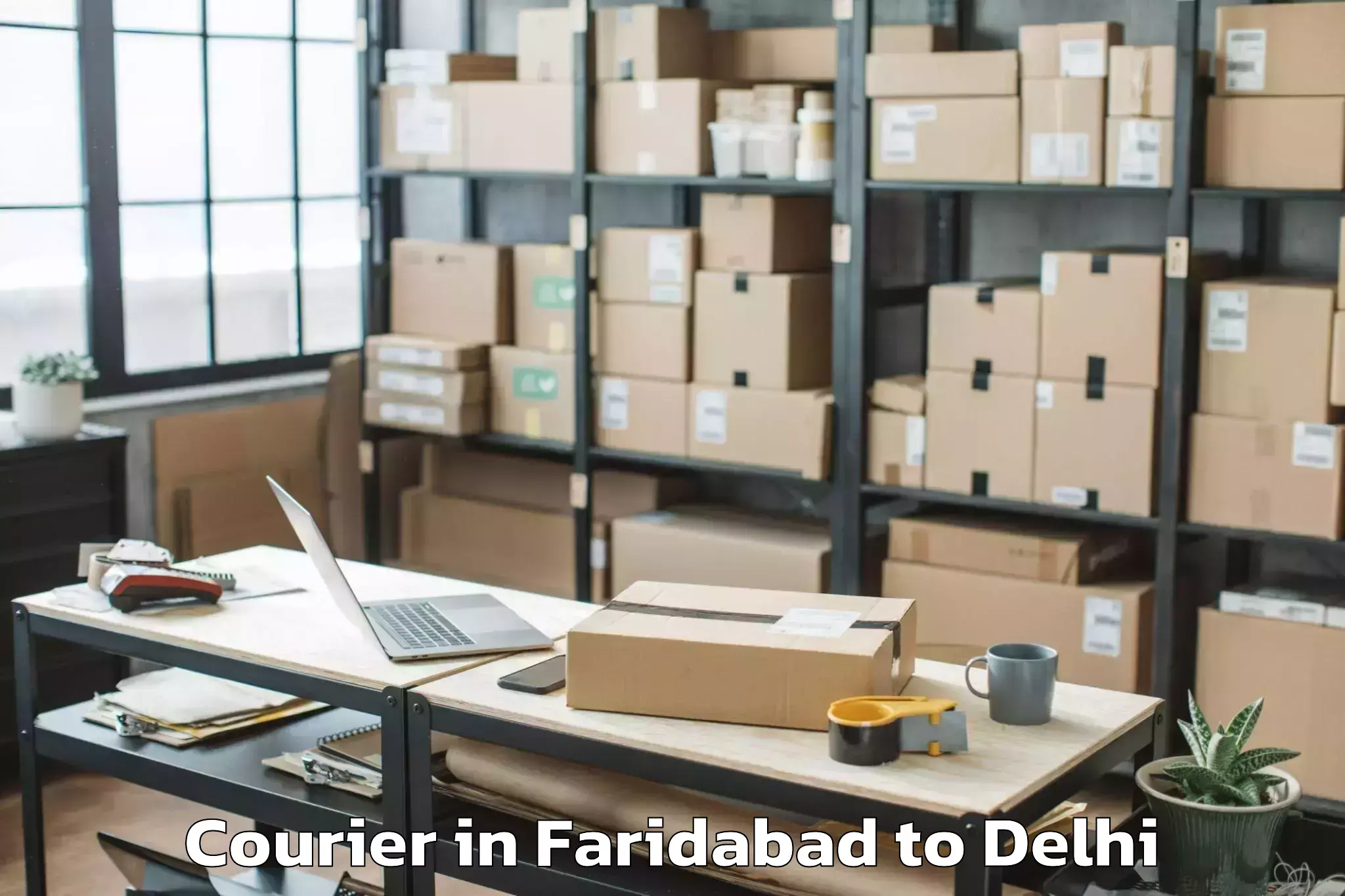 Reliable Faridabad to Saraswati Vihar Courier